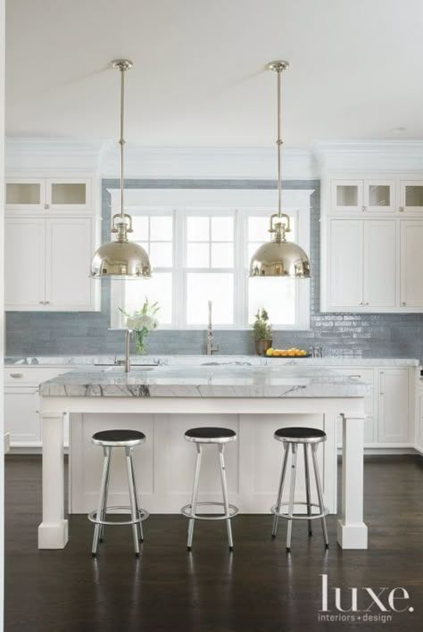 Shades of grey Brilliant Kitchen Backsplash Ideas | LuxeSource | Luxe Magazine - The Luxury Home Redefined Luxury White Kitchen, Luxe Kitchen, White Kitchen Ideas, Grey Backsplash, Gray And White Kitchen, White Shaker Cabinets, Kitchen Lights, White Kitchen Design, White Kitchens