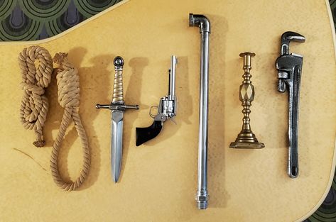 "Clue" 2022 Weapons and Set Dressing (2) | Images :: Behance Props Design, Mystery Dinner Party, Set Dressing, Mystery Dinner, Prop Design, Clue, Art Direction, Set Dress, Dinner Party