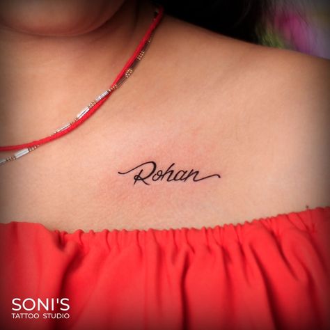 Name Tattoo of near and dear one Tattoo on collar bone Soni's Tattoo Studio 09974432274 Navsari Gujarat . Tattoo done by your favourite artist @nitesh_devi_soni at most Trusted Tattoo Studio of town @sonistattoo_by_nitesh . #sonistattoo #navsari #gujarat #india #tattoo #besttattooingujarat #besttattooinindia #tattooingujarat #tattooinindia #tattoos #tattooartist #tattooideas #tattooist #tattoolife #tattoodesign #tattoolove #tattoowork #art #tattoostudio #tattooart #tattoopro #proffesionaltat Name Tattoo On Collar Bone For Women, Name Tattoo Collar Bone, Collar Bone Tattoo Name, Name On Collar Bone Tattoo, Collar Bone Name Tattoo, Name Tattoos For Women Chest, Husband Name Tattoos For Women Chest, Chest Tattoo Name, Tattoo On Collar Bone