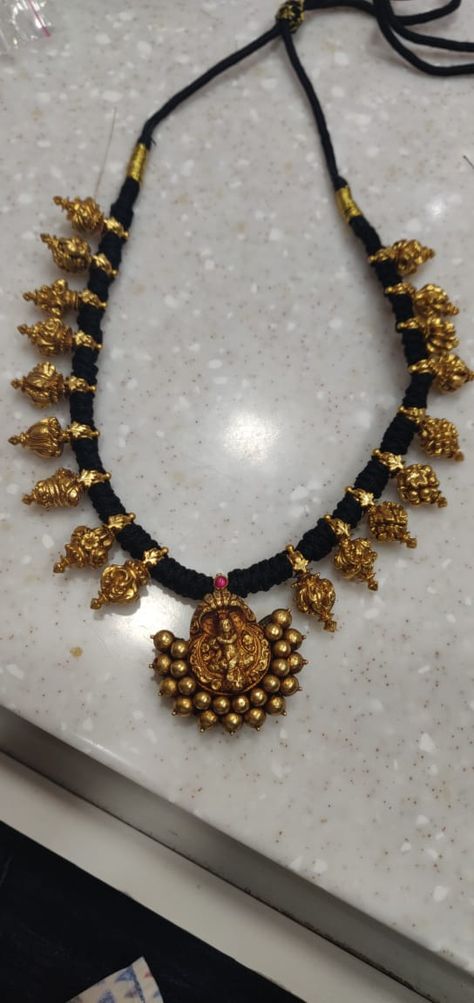 Antique nagar pendant and kaai Maalai in black thread Thread Jewellery Gold, Black Thread Gold Jewellery, Black Thread Jewellery Indian, Black Thread Necklace, Pearls Chains, Ruby Chain, Pearl Earrings Designs, Temple Jewellery Earrings, Temple Jewelry Necklace