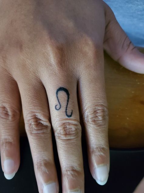 Lion Finger Tattoo For Women, Water Sign Finger Tattoo, Leo Finger Tattoo, Leo Zodiac Finger Tattoo, Lion Tattoo On Finger, Leo Sign Tattoo, Leo Constellation Tattoo, Ring Tattoo Designs, Ring Finger Tattoos