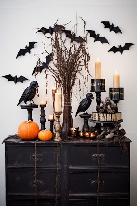 Transform your black dresser into a haunting centerpiece with candles, crows, and intricate costumes. Get inspired by this detailed, high-quality tabletop photography. #HalloweenDIY #YankeeCore Centerpiece With Candles, Tabletop Photography, Black Dresser, Halloween Tablescape, Halloween Party Dinner, Homemade Halloween Decorations, Halloween Room Decor, Halloween Facts, Halloween Spooktacular