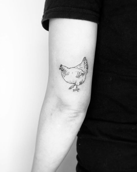 Small chicken tattoo by Jake Harry Ditchfield - Tattoogrid.net Chicken Tattoo For Men, Small Chicken Tattoo Simple, Simple Chicken Tattoos For Women, Chicken Tattoo Ideas Simple, Fine Line Chicken Tattoo, Tiny Chicken Tattoo, Simple Chicken Tattoo, Chicken Tattoos For Women, Small Chicken Tattoo