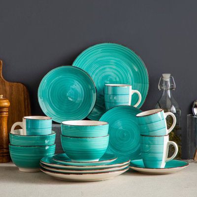 Bella series porcelain dinnerware set is elegant and practical, offering tasteful and high-quality porcelain table services in a pure style that goes with any ambiance. Color: Green | Bungalow Rose Bella 16 Piece Dinnerware Set, Service for 4 Porcelain/Ceramic in Green | Wayfair Green Bungalow, Green Dinnerware, Square Dinnerware Set, Stoneware Dinnerware Sets, Stoneware Dinnerware, Porcelain Dinnerware, Kitchen Diy, Dinner Sets, Blue Teal