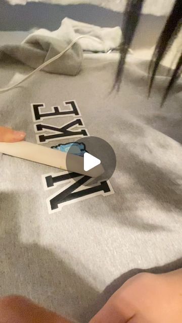 Making Nike Sweatshirts, Diy Nike Sweatshirt Iron On Hobby Lobby, Homemade Nike Sweatshirt, Diy Nike Hoodie, Nike Sweatshirts Diy, Diy Nike Sweatshirt, Diy Sweatshirt Ideas, Iron On Patch Ideas Clothes, Nike Craft