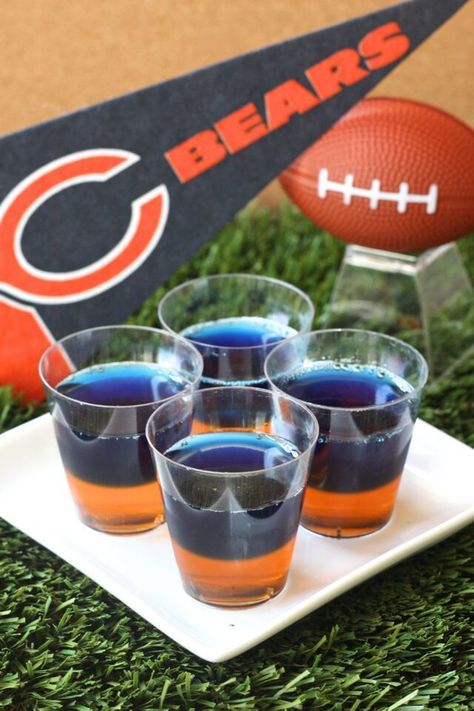 Chicago Bears Jell-O Shots (3 oz. box orange Jell-O 2 envelopes Knox plain gelatin  2 cup vodka  3 oz. box berry blue Jell-O Navy blue food coloring) Jell O Shots Recipe, Packers Party, Jell O Shots, Jello Shot Recipes, Chicago Bears Football, Football Tailgate, Blue Food Coloring, Bears Football, Shot Recipes