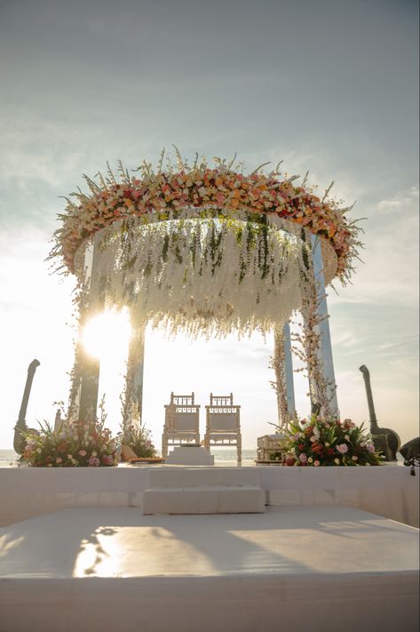 Beach mandap at Lalit Goa Beach Mandap Decor, Beach Wedding Mandap, Pheras Decor, Beach Mandap, Beach Wedding Setup, Glass Walkway, Mandap Design, Goa Wedding, Outdoor Evening