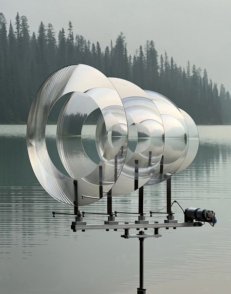 the optic ripples echo the almost imperceptible motions of the water, transforming the landscape into a poetic vision. Kinds Of Clouds, Le Bristol Paris, Canadian Lakes, Blurry Lights, Gestural Abstraction, Coral Garden, Glass Installation, Emerald Lake, Kinetic Art