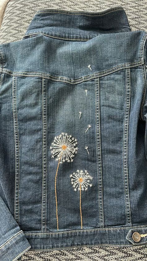 Adding Embroidery To Clothes, Jean Jacket Embroidery Ideas, Embroidery Inspiration Jeans, Denim Jacket Embroidery Ideas, Clothing Embroidery Ideas, Jeans Embroidery Ideas, Embroidery Inspiration Clothing, Embroidering Clothes, Dandelion Embroidery