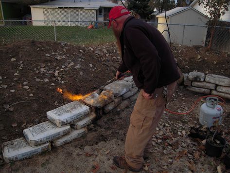 Rob thinks I'm gonna use little field stones to build two 40x4 ft retaining walls---hell no, concrete bag retaining walls!!!! Concrete Bag Retaining Wall, Retaining Wall Ideas, Concrete Bags, Building A Retaining Wall, Concrete Retaining Walls, Gabion Wall, Landscaping Retaining Walls, Hillside Landscaping, Yard Project