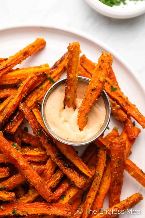 Have you ever tried carrot fries? If not, you need to! They're an easy-to-make, delicious, and healthy side dish. Seasoned to perfection, the sweetness of the carrot amplifies as the natural sugars caramelize, and the outside becomes crispy and delicious while the inside stays soft. Carrot fries are a healthy recipe that feels like a treat! #theendlessmeal #carrots #carrot #carrotfries #fries #sidedish Carrots In The Air Fryer, Carrot Fries Baked, Balanced Dinner, Butternut Squash Fries, Frozen Sweet Potato Fries, Squash Fries, Carrot Fries, Baked Carrots, Sweet Carrot