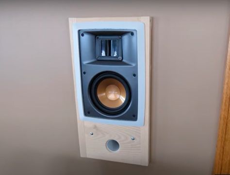 8 Ways How to Hide Large Speakers in Living Room - HomeProfy Tv Speakers Living Room Wall, Media Wall With Speakers, Hiding Subwoofer In Living Room, Big Speakers In Living Room, Surround Speakers Living Room, Hiding Surround Sound Speakers, Built In Speakers Wall, Bookshelf Speakers Living Rooms, Rear Speakers Living Room