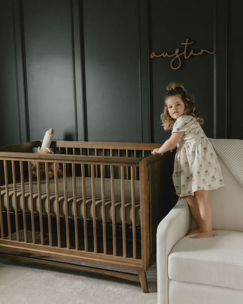 “LOVE LOVE LOVE !!! We ordered the walnut script for my son’s nursery, the walls are black and it looks absolutely STUNNING! So happy with how it completed his nursery! This is our second time ordering, and always such a pleasure to deal with! Also super speedy delivery!!” Nursery Design and Review by @samanthaaquail Newborn Photograohy by @rachelbowmanphotography Sign Featured: Nursery Name Script in Walnut #nurserytheme #darkandmoody #nurserywalldecor #boynursery #babyboystyle #babyb... Green Black Nursery, Dark Walls Nursery, Emerald Green Nursery Gender Neutral, Board And Batten Wall Nursery, Olive Nursery, Dark Green Nursery, Baby Name Signs For Nursery, Black Nursery, Board And Batten Wall