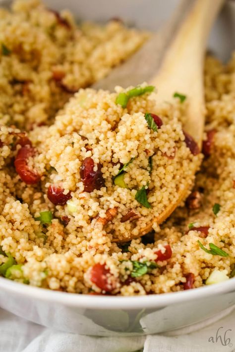 Fruity, nutty, fresh, and delicious Cranberry Couscous Salad is a delightfully different side dish that’s easy to make and pairs well with pork, chicken or turkey. Big Mac Tater Tot Casserole, Cranberry Couscous, Moroccan Couscous Salad, Bic Mac, Curried Couscous, Cranberry Salad Recipes, Unique Side Dishes, Tator Tots, Pork Chicken