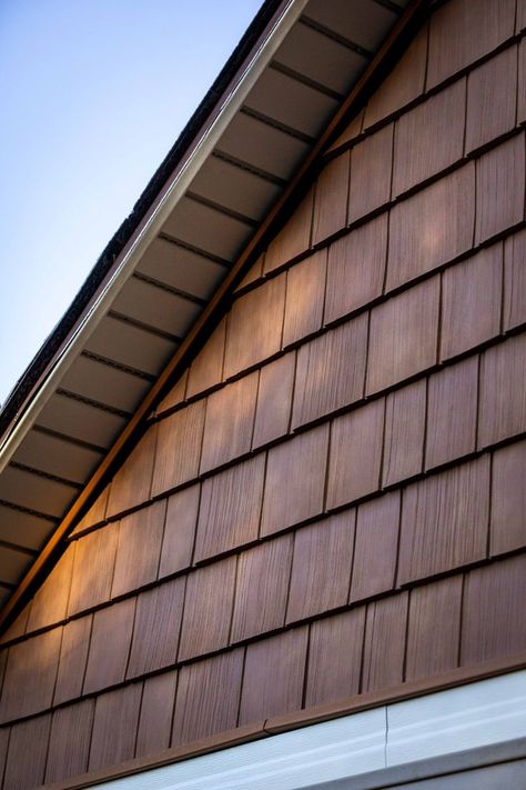 cedar vinyl siding on a house in an amber orange brown color Shaker Siding Exterior, Vinyl Siding Ideas Exterior, House Siding Ideas Exterior, Bungalow Exterior Colors, Vinyl Siding Ideas, Cedar Shake House, Cedar Vinyl Siding, Cedar Siding Exterior, Cedar Siding Colors