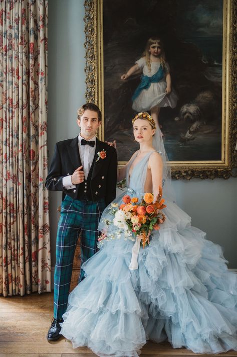 a romantic + voluminous blue tulle wedding gown and a tartan trouser groom look for a wedding shoot at a English country estate Colorful Bride And Groom, Blue Floral Wedding Dress, Maximalist Wedding Dress, Blue And Beige Wedding, December Wedding Dress, Blue Wedding Aesthetic, Wedding Blue Dress, Blue Bridal Gown, Tartan Wedding Dress