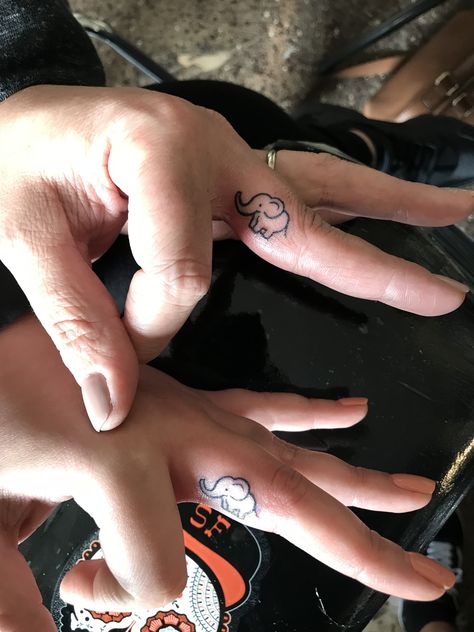 Mother daughter matching tattoos Small elephant tattoo Finger tattoo Mother Daughter Matching Tattoos, Elephant Finger Tattoo, Little Elephant Tattoos, Small Elephant Tattoo, Tattoo Finger, Elephant Tattoo Design, Stylish Tattoo, Inspiration Tattoos, Small Elephant