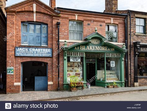 Download this stock image: The Grocer's Shop and Cycle Showroom at the Blists Hill Victorian Town, near Madeley, Shropshire, England, UK. - J19F9P from Alamy's library of millions of high resolution stock photos, illustrations and vectors. Siam Discovery, Store Front Windows, English Architecture, Shop Fronts, Shop Front, Store Fronts, Stock Photography, Coffee Shop, Showroom