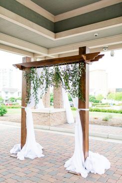 wood wedding arch with greenery - Luke & Ashley Photography Wedding Arch Wood Rustic, Wedding Arbour Ideas, Wedding Arch Wooden, Arbor Decorations Wedding, Wedding Arch With Greenery, Wood Wedding Arch, Arch With Greenery, Wood Wedding Arches, Wedding Arch Rental