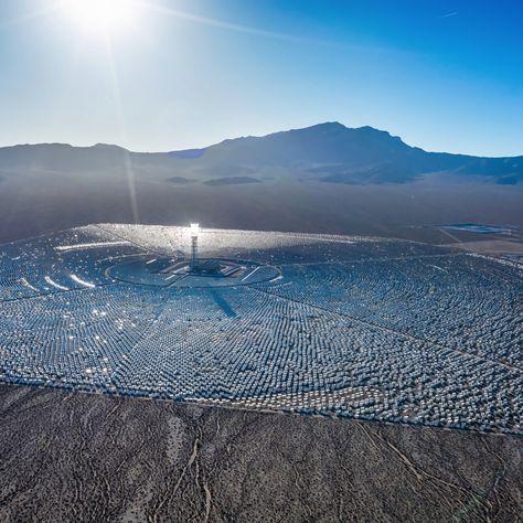 California’s Mojave Desert is home to Ivanpah Solar Power Facility, the world’s largest operating solar thermal energy plant. It uses concentrating solar power (CSP) technology to focus 173,500 heliostats, each containing two mirrors, onto boilers located in three power towers. Solar Thermal Energy, Power Towers, Two Mirrors, Solar Thermal, Thermal Energy, Mojave Desert, Solar Energy, Solar Power, Airplane View