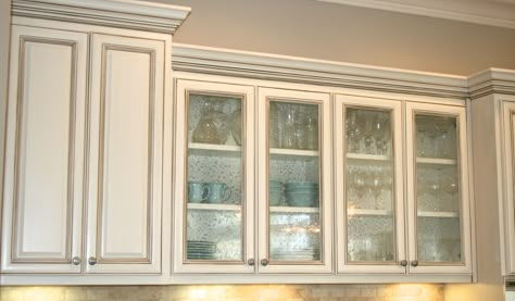 AFTER~seeded glass cabinets to display a pop of color in the kitchen. Glazed ivory cabinets, wall color Revere Pewter. Leaded Glass Upper Kitchen Cabinets, Seedy Glass Cabinet Doors, Seeded Glass Kitchen Cabinet Doors, Seeded Glass Cabinet Doors, Leaded Glass Cabinet Doors, Seeded Glass Cabinets, Leaded Glass Cabinets, Custom Closet Doors, Interior Doors Modern