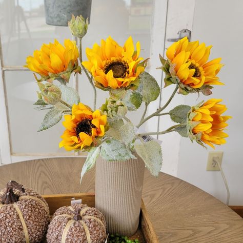 Use our Julie Sunflower Spray inside or outside! 🌻 This beautiful silk flower is stunning in a vase or striking in your porch pot for fall color 🍂 Find this wired stem in-store or online for your next project! 🔎 Julie Sunflower Spray #silkflowers #homedecorinspo #fauxflowers Silk Sunflower Arrangements, Sunflower Arrangements, Vase Display, Faux Floral Arrangement, Fragrance Gift, Flameless Candles, Lantern Candle Holders, Patriotic Decorations, Fall Floral