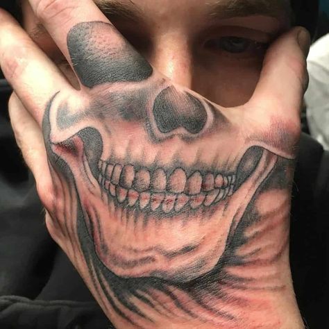 Hand Tattoo Skeleton Face, Mouth Hand Tattoos For Guys, Hand Tattoos Face Mask, Hand Tattoos For Guys Skull, Skeleton Mouth Hand Tattoo, Hand Face Tattoos, Smile Tattoo On Hand, Skeletal Hand Tattoo, Skeleton Hand Tattoos For Guys