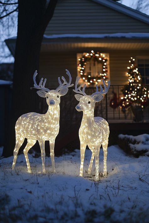 Two white-lighted deer in front of a house adorned with colorful Christmas lights for the holiday season. Decor With Lanterns, Giant Candy Cane, Outdoor Christmas Decoration Ideas, Mushroom Forest, Deer Decor, Christmas Decoration Ideas, Christmas Porch Decor, Twinkling Lights, Festival Diy