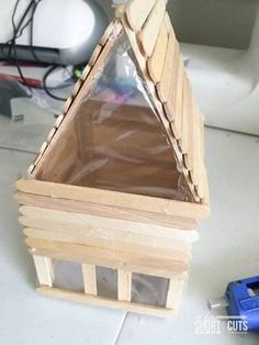 Don't have bored kids this summer. Learn How to Make a Fairy House. This is such a fun and creative craft project. Fairy Houses Kids, Make A Fairy House, Flower Wall Hanging Decor, Kids Fairy Garden, Diy Paper Wall Hanging, Room Hanging Decor, Popsicle Stick Houses, Fairytale Houses, Make A Fairy