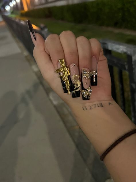 Black Nails With Gold Rhinestones, Ak47 Nails, Black N Gold Nails, Money Nails Acrylic, Gold Long Nails, Black And Gold Nails Acrylic, Gangster Nails Designs, Gangsta Nails, Black And Gold Acrylic Nails