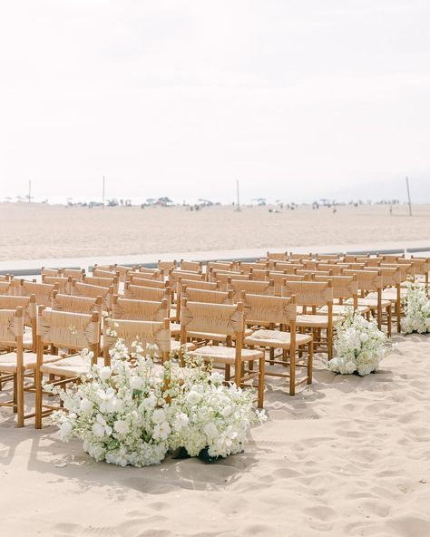 There’s nothing better than a wedding on the beach!🤍��🌊 Design & Coordination: @alwaysallegra_ Venue: @jonathanclub Photography: @ashleyburnsphotography Floral Design & Artistry: @epausini Bride & Groom: @jackiebmcp & @scott__mcpherson #beachwedding #weddinginspo #beachweddingdecor #beachweddingideas #eventrentals #weddingrentals #rentals #foundrentals Beach Wedding Cocktail Hour Decor, Beach Wedding Chairs, Neutral Beach Wedding, Beach Ceremony Decor, Beach Wedding Florals, Beach Florals, Beach Wedding Seating, Beach Wedding Aisle, Cream Wedding Theme