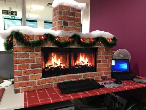 this is a cardboard fireplace I made for my desk at work. Cubicle Christmas Decor Ideas, Office Desk Christmas Decor For Work, Desk Christmas Decorations Work, Christmas Desk Decorations Cubicles, Christmas Office Desk, Christmas Boxes Decoration, Christmas Desk Decorations, Desk Fireplace, Cubicle Decorations