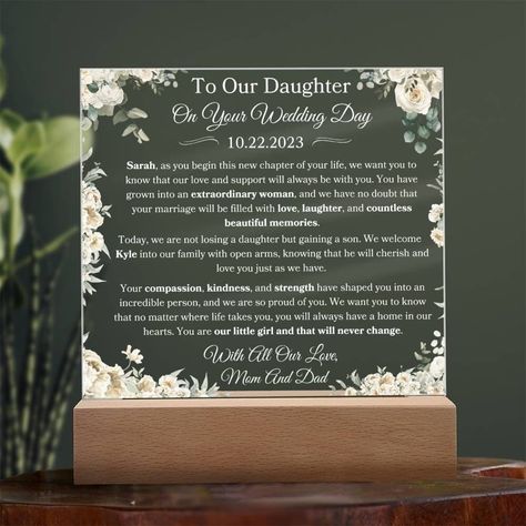 Celebrate the most special day of your daughter's life with our Personalized Square Acrylic Plaque, a heartfelt gift from parents to bride on her wedding day. This elegant and sentimental keepsake is a beautiful way to express your love and best wishes as she begins this new chapter. Customize the plaque with a loving message, her name, and the date of the wedding to make it truly unique. Its clear acrylic design adds a touch of modern sophistication, while the heartfelt words etched into the pl Parents Of The Bride, Parents In Law, Personalized Plaques, Wedding Day Gifts, Acrylic Plaque, Create And Craft, Wedding Memorial, Gifts For New Parents, Memorial Keepsakes