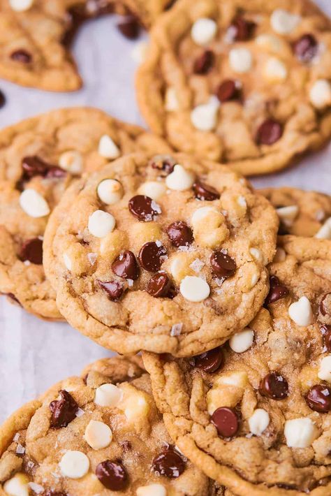 These Chocolate Chip and White Chocolate Chip Cookies are like two cookies in one! These delicious cookies are an elevated version of classic chocolate chip cookies, bursting with both semi-sweet chocolate chips and white chocolate chips. These chewy cookies have nice crispy edges, and they will definitely satisfy your sweet tooth. White Chocolate And Chocolate Cookies, Chocolate Chip And White Chip Cookies, Milk And White Chocolate Chip Cookies, Chocolate And White Chip Cookies, Black And White Chocolate Chip Cookies, Recipes Using Semi Sweet Chocolate Chips, White And Chocolate Chip Cookies, Cookie With White Chocolate Chips, White And Dark Chocolate Chip Cookies