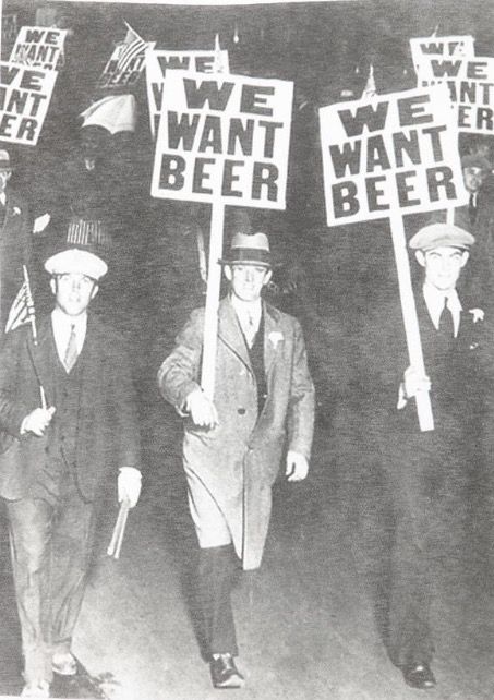 in this photograph, people were protesting the prohibition in America. Obviously the protesting was not effective so the citizens all across america took matters into their own hands but selling and buying illegally. 1920 Bar, Prohibition Bar, Prohibition Party, Speakeasy Party, Roaring 20s Party, 1920s Party, Gatsby Party, Roaring 20s, African Diaspora