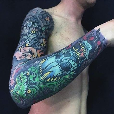 Green Gorilla With Blue Skull Mens Colorful Full Sleeve Tattoos Colorful Tattoos For Men, Traditional Tattoo Arm, Family Sleeve Tattoo, Arm Cover Up Tattoos, Colorful Sleeve Tattoos, Sleeve Tattoos For Men, Green Tattoos, Colorful Tattoos, The Trend Spotter