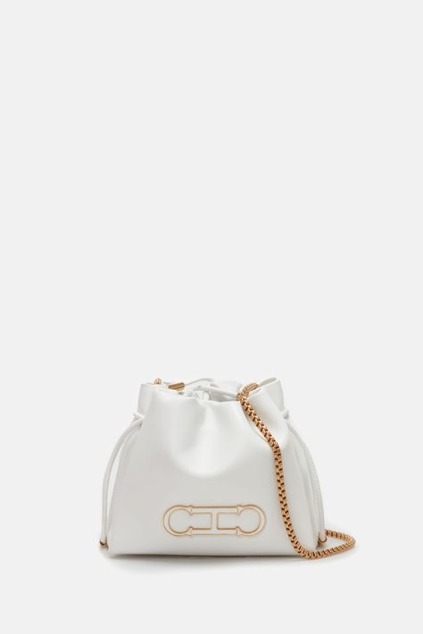 Initials Insignia Soft Bucket | Small cross body bag white - CH Carolina Herrera United States Carolina Herera, Carolina Herrera Bags, Small Cross Body Bag, Ch Carolina Herrera, Small Crosses, Unique Bags, Small Crossbody Bag, Carolina Herrera, Cross Body Bag