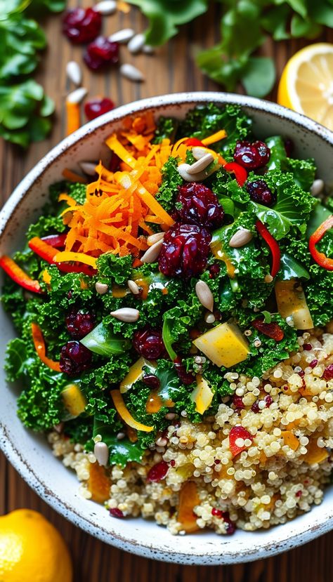 Vegan Quinoa and Kale Salad  Ingredients: - 1 cup quinoa - 2 cups water - 1 bunch kale, chopped - 1 large carrot, grated - 1 red bell pepper, diced - 1/4 cup sunflower seeds - 1/4 cup dried cranberries  Dressing: - 3 tbsp olive oil - 2 tbsp lemon juice - 1 tbsp apple cider vinegar - 1 tsp Dijon mustard - Salt and pepper to taste  Instructions: 1. Rinse quinoa and cook in water over medium heat for 15 minutes. 2. In a large bowl, combine quinoa, kale, carrot, bell pepper, sunflower seeds, and cranberries. 3. Whisk dressing ingredients until emulsified. 4. Pour dressing over salad and toss well. 5. Serve immediately or chill for 30 minutes. Enjoy! Veggie Diet, Lunch Bowls, Quinoa Kale, Vegan Quinoa, Lunch Bowl, Healthy Food Motivation, Interesting Food, Kale Salad, Quinoa Recipes