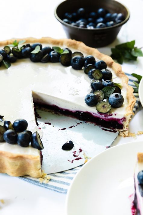 With it's layers of blueberry filling and creamy panna cotta, this tart is a elegant, refreshing choice for summer desserts. Easiest Desserts, Cheesecake Tart, Vanilla Bean Cheesecake, Cheesecake Tarts, Fruity Cake, Eggless Desserts, Berry Compote, Simple Dessert, Easy To Make Desserts