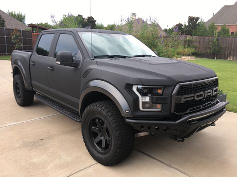 My finished 2017 Ford Raptor Custom Kevlar matte textured paint job Rotifom flat black 17x9 wheels A.D.D. Custom front and back bumpers Rigid Radiance amber back light lights Ford Raptor Upgrades, Ford Raptor Matte Black, Matte Black Ford Raptor, Raptor Liner Paint Job, Raptor Paint, Black Ford Raptor, Black Car Paint, Custom Car Paint Jobs, Bed Liner Paint