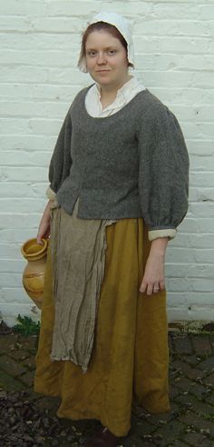 Typical 17th century peasant clothing, as interpreted by historical reenactor. 17th Century Dress Peasant, Funny Maternity Photography, The Tudors Costumes, 17th Century Dress, Peasant Clothing, 17th Century Clothing, Maternity Photography Family, Tudor Costumes, 17th Century Fashion