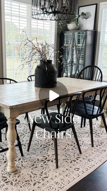 Sherri Middleton on Instagram: "🖤SALE ALERT!! Love my new side chairs and the lighter feeling my dining room now has.  🖤Comment SHOP for links sent to your DM. Make sure you are following me or IG will block the link.  These new side chairs are exactly what I was looking for. I love the curved back and spindles. They’re super comfortable and complement the Windsor chairs I already had. My dining room looks and feels bigger and airier.   You can also shop by taking a screen shot of this link⬇️ saving to photos and then tapping on the link. https://liketk.it/4FaYl  All items are in my LTK shop.  Side chairs Windsor chairs Dining room Dining table Dining room rug Modern organic vintage Chic living Neutral home Neutral decor Neutral furniture  Affordable home decor Spring decor Home trends C Light Wood Dining Table With Black Chairs, Dining Room Rug Modern, Transitional Dining Room Inspiration, Modern Boho Dining Room, Home Neutral, Christmas Dining Table Decor, Modern Farmhouse Living Room Decor, Modern Farmhouse Dining Room, Home Decor Spring