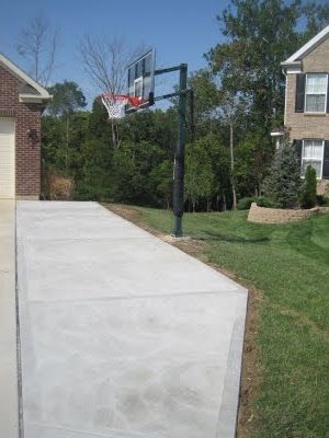 Growing up, just about everyone had a basketball goal in their driveway. Basketball Hoop Driveway, Concrete Extension, Basketball Court Backyard, Backyard Basketball, Basketball Goal, Driveway Design, Driveway Landscaping, Paver Driveway, Basketball Goals