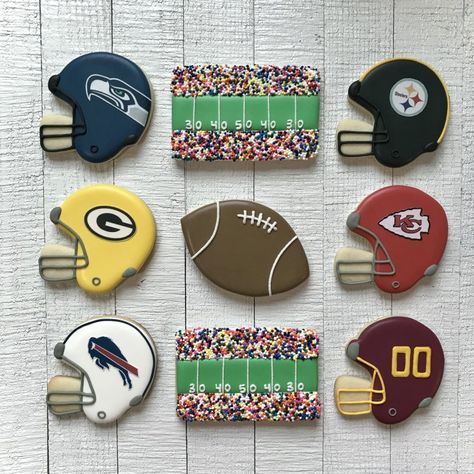 Seahawks, Packers, Bills, Steelers, Chiefs, and Washington football sugar cookies Nfl Cookies Decorated, Football Helmet Cookies Decorated, Football Royal Icing Cookies, Super Bowl Cookies Decorated, Football Sugar Cookies Royal Icing, Football Helmet Cookies, Football Cookies Decorated, Nfl Cookies, Manly Cookies