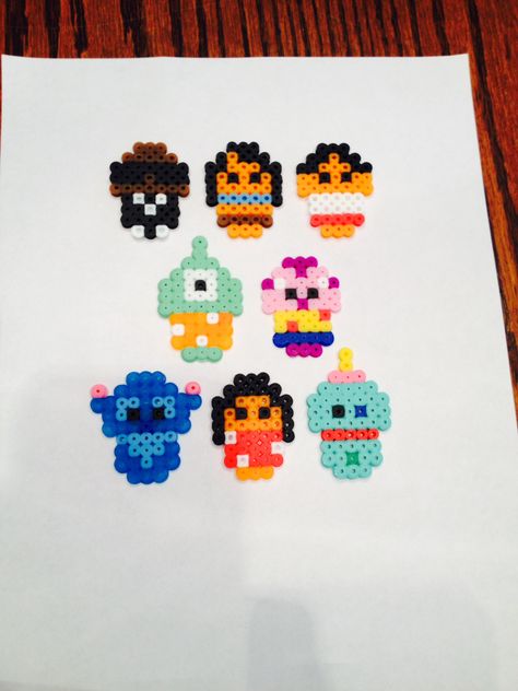 Lilo and Stitch cast out of pearler beads Perler Bead Art Disney, Perler Beads Ideas Stitch, Disney Fuse Bead Patterns, Peeler Bead Stitch, Disney Pearler Beads, Lilo Perler Beads, Perler Beads Lilo And Stitch, Stitch Disney Perler Beads, Pearler Beads Stitch