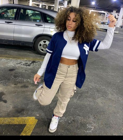 baseball jersey, cargo tan pants, white long sleeve crop top, and jordan 3s Long Sleeve Cropped Top Outfits, Cropped Baseball Jersey, Baseball Jersey Outfit, Styling Jordans, Teen Fashion Trends, White Long Sleeve Crop Top, Black Long Sleeve Crop Top, Chic Outfit Ideas, Cargo Pants Outfit