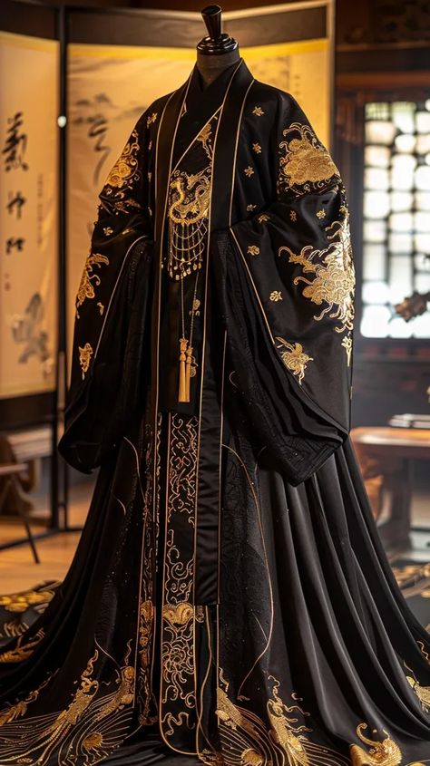 The image shows a black hanfu with golden embroidery. The hanfu is a traditional Chinese garment ->> more details in ai-img-gen.com Black Hanfu, Cloud Embroidery, Court Attire, Props Design, Chinese Emperor, Ancient Dress, Black Cloak, Golden Embroidery, Golden Dragon