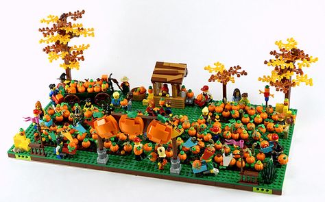 It’s gourds galore in this festive fall scene. - The Brothers Brick | The Brothers Brick Lego Pumpkin, Lego Master Builder, Lego Plants, Awesome Lego Creations, Lego Halloween, Lego Town, The Great Pumpkin, City Family, Lego Room