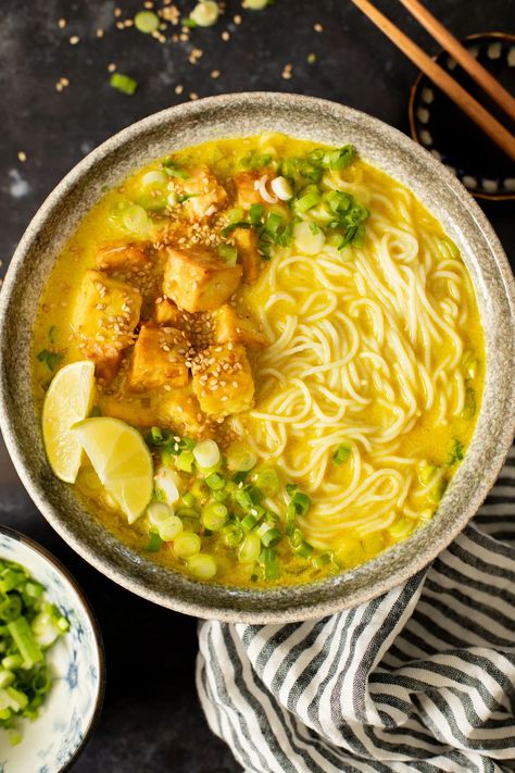 This Golden Coconut Noodle Soup is healthy & heart warming. A coconut curry broth, crispy baked tofu & tender rice noodles | ThisSavoryVegan.com #vegansoup #noodlesoup #healthysoup Coconut Noodle Soup, Vegetarian Noodle Soup, Chicken Noodle Soup Healthy, Curry Broth, Plant Based Soups, Fall Soup Recipes, Crispy Tofu, Baked Tofu, Fall Soups