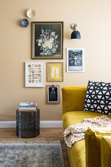 A neutral yellow that's almost beige + a mustard sofa = a winning combo for a living room. #yellow #mustard #living room Room Ideas Yellow Walls, Living Room Ideas Yellow, Room Ideas Yellow, Mustard Living Room, Mustard Sofa, Yellow Walls Living Room, Living Room Yellow, Good Living Room Colors, Room Yellow